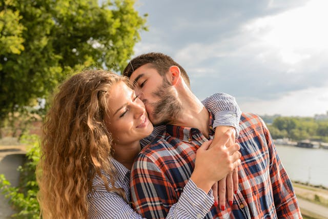 Romantic couple hugging.